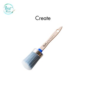May include: A round-tipped paintbrush with a light blue and white bristle head. The wooden handle has the text "Paint Pixie Create 10". The word "Create" is printed in black. The brush is designed for painting.
