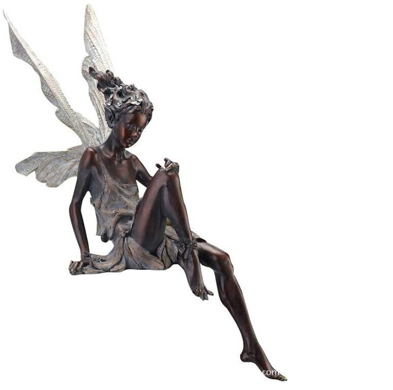 turek sitting fairy statue