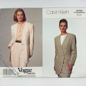May include: A Calvin Klein Vogue Patterns sewing pattern envelope, number 2724, for sizes 8-10-12. The front displays two views of a long-line, double-breasted blazer with a collarless neckline, shown in light beige and grey fabric options.