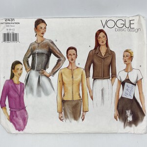 May include: A sewing pattern for a jacket with four different styles. The pattern is from Vogue, and the pattern number is 2431. The pattern is for sizes 8-10-12.