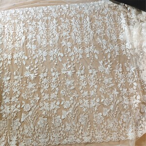 Elegant elfenbensblommig broderi spetstyg mjuk spets vinranka tyg paljett elfenbenslöv broderi spetstyg för bröllopsklänning hantverksprojekt