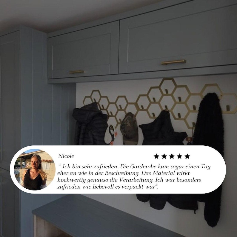 May include: A modern entryway with light blue cabinets and a gold honeycomb-shaped coat rack. Several coats and a pair of shoes hang on the rack. A bench sits below the rack. A customer review is visible in the image.