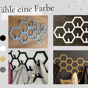 May include: A wall-mounted coat rack with a honeycomb design, shown in four color options: silver, white, black, and gold. The rack features multiple hooks for hanging coats, bags, or other items. The text "W&auml;hle eine Farbe" is at the top.