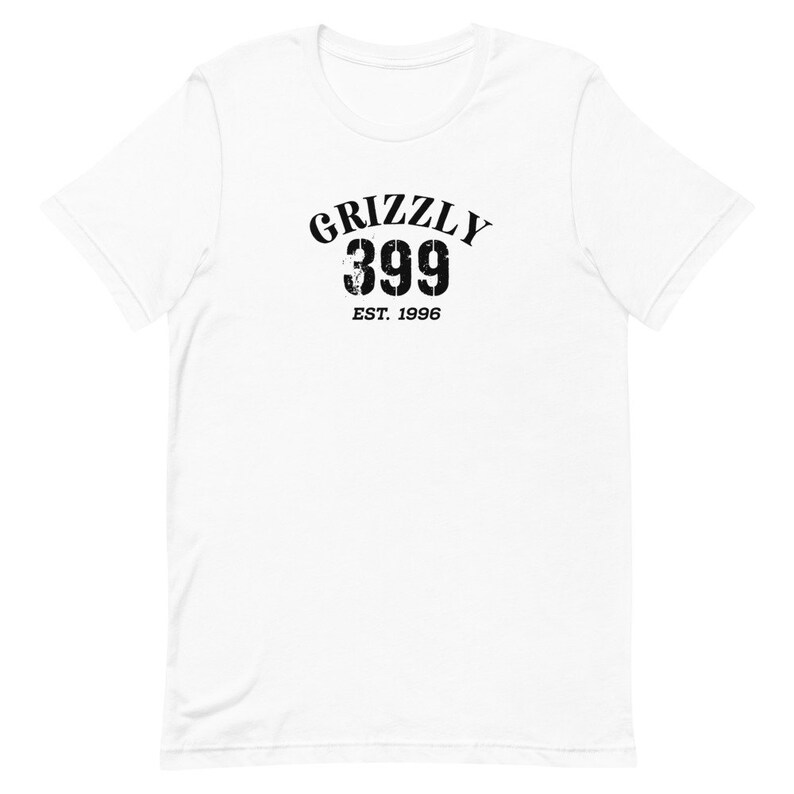 May include: White t-shirt with black text that reads "Grizzly 399 Est. 1996"