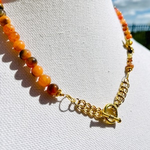 Orange Agate Beaded Necklace: Gold Chain with Dragonfly Clasp
