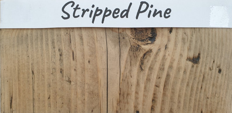 May include: Stripped Pine wood panel with a natural wood grain and knots. The wood has a light brown color with darker brown knots.