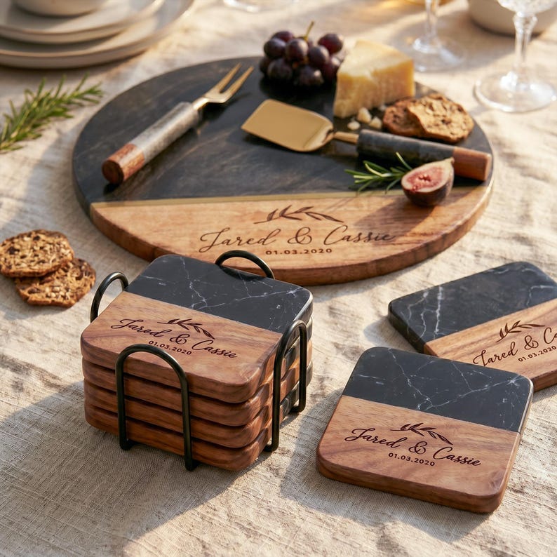 a set of coasters and a cheese board with personalized text, arranged on a table.