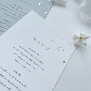 Moon and Stars Modern Minimalist Celestial Gold Foil Wedding Menu Card, white, blue, translucent, vellum, calligraphy script, simple, foiled