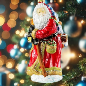 Santa Claus with a Wooden Backpack Glass Christmas Ornament Handmade in Poland, perfect for a gift