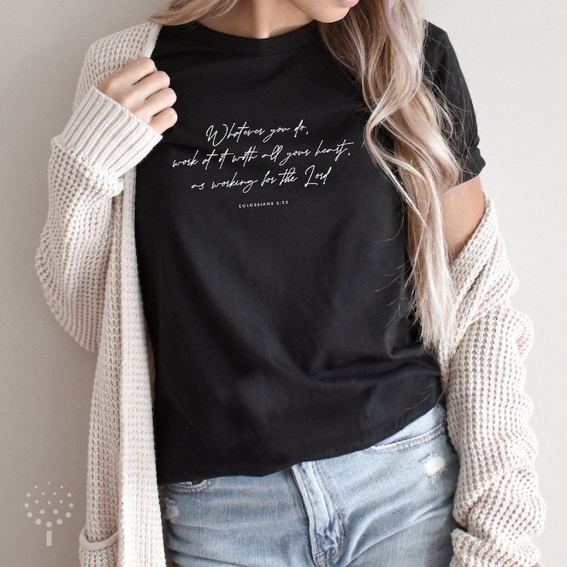 May include: Black t-shirt with white text that reads "Whatever you do, work at it with all your heart, as working for the Lord. Colossians 3:23"