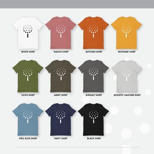 May include: A graphic design of a tree with a white outline on a variety of t-shirt colors. The colors include white, mauve, autumn, mustard, olive, army, asphalt, athletic heather, steel blue, navy, and black.
