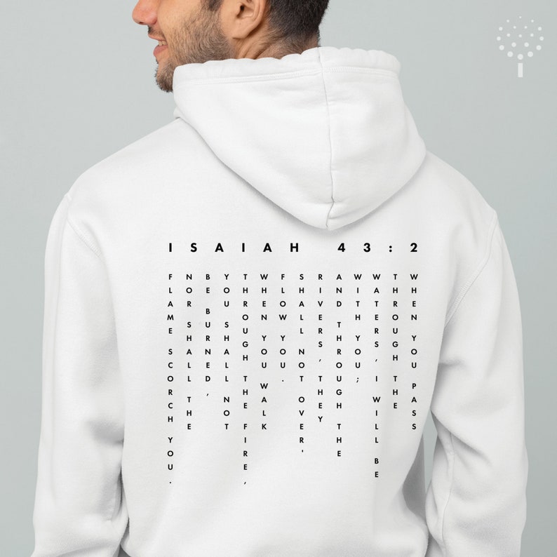 May include: White hoodie with a black print of the text "ISAIAH 43:2" and a word search puzzle with the words "FIRE" and "THE" visible.
