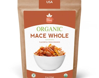 May include: A brown paper bag of organic mace whole. The bag has a brown and orange label with the text "Organic Mace Whole" and "Flavorful Fresh Essence." A white bowl filled with mace is shown. The bag is labeled "Packed in USA" and contains 8 oz (226g).