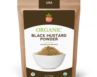 May include: A brown paper bag with a label that says "Packed in USA" and "Organic Black Mustard Powder" with a picture of a bowl of the powder. The label also says "Naturally Pure Spice" and "8 oz (226g)".