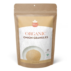 May include: A brown kraft paper pouch containing organic onion granules. The label features the text "SPICY ORGANIC," "ORGANIC ONION GRANULES," "Vegan Friendly," "USDA ORGANIC," and "16 oz (454 g)" with a graphic of a bowl of granules.