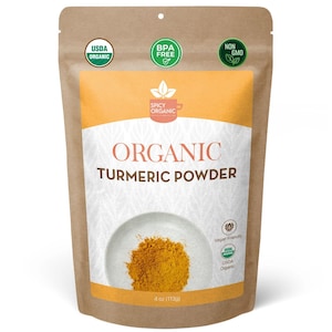 May include: A brown stand-up pouch of Spicy Organic Turmeric Powder. The label features the text Organic Turmeric Powder, USDA Organic, BPA Free, and Non GMO logos. A circular image shows a pile of yellow turmeric powder. Net weight is 4 oz (113g).
