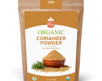 May include: A brown paper bag with a label that says "Organic Coriander Powder" in white text. The label also says "Naturally Pure Spice" and "16 oz (454g)". There is a small bowl of coriander powder and a sprig of coriander leaves on the label.