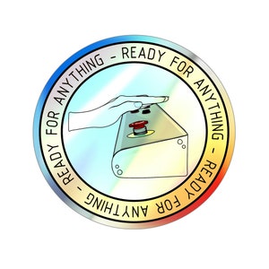 May include: A circular sticker with a holographic finish features a hand pressing a red button on a device. The sticker has the text "Ready for anything - Ready for anything" repeated around the edge.