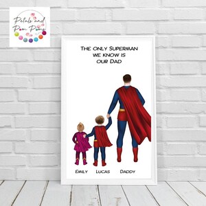May include: A digital illustration of a father and two children dressed as superheroes. The father is wearing a blue and red Superman costume. The children are wearing red and blue superhero costumes. The text "The only Superman we know is our Dad" is written above the image. The names "Emily", "Lucas", and "Daddy" are written below the image.