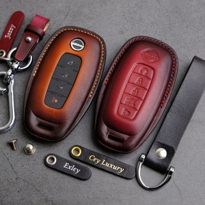Leather Cover For 2024 2023 Nissan Kicks Rogue Pathfinder Ariya Sentra Altima Tintan ... Nissan Key Case Key Chain Stamp Emblem Accessory