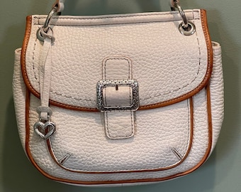 Like New Genuine Brighton ivory handbag made with embossed leather.