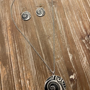 Lia Sophia necklace and earrings set.