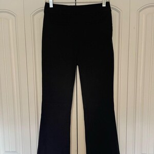 Anthropologie Black Flare Pants image 1