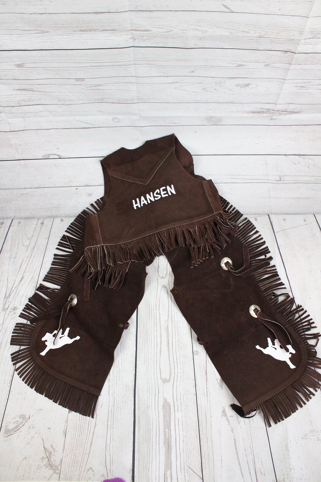 Leather chaps and vest deals