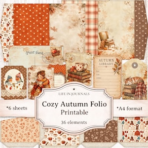 May include: A collection of printable paper sheets and elements featuring autumn-themed illustrations including pumpkins, birds, cats, books, and mugs. The text reads LIFE IN JOURNALS Cozy Autumn Folio Printable, 6 sheets, A4 format, and 36 elements.