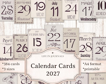 May include: A collection of printable 2027 calendar cards featuring various dates, months, and seasonal illustrations. A central label displays the text LIFE IN JOURNALS Calendar Cards 2027, 384 cards, 3 sizes, and A4 format.