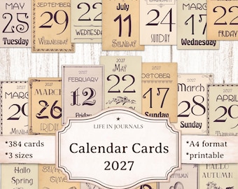 May include: A collection of 2027 calendar cards in A4 format featuring vintage-style typography, dates, and botanical illustrations. The cards display various months, days, and years, with a central label reading Life in Journals Calendar Cards 2027.