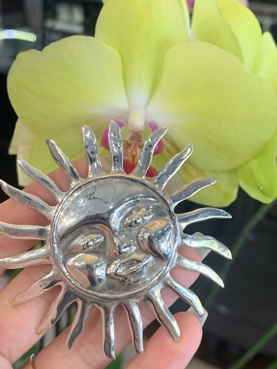 Vintage sterling silver Mexican sun pin