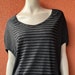 see more listings in the tops, tees section