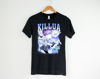 May include: A black short-sleeve t-shirt featuring a graphic print of the anime character Killua in various poses with blue lightning effects. The name KILLUA is printed in large, bold, light blue letters at the top of the graphic design.
