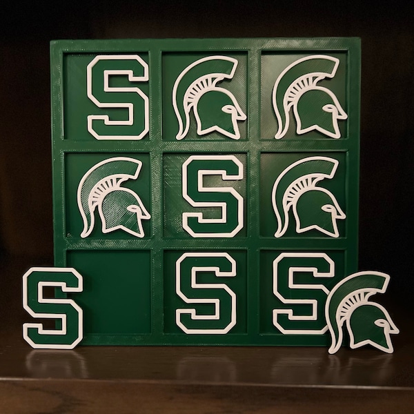 Michigan State University themed. Spartan S and Spartan Helmet. Tailgating fun. Comes with storage bags for board and pieces.