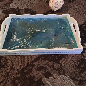 Wooden modern tray with lace details and liquid glass.Very elegant ornament for your table at home or at work. Excellent gift for a wedding.