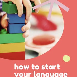 May include: A child's hand stacking colorful building blocks. The blocks are green, blue, yellow, and red. The image has a coral background with the text "how to start your language learning journey at home".