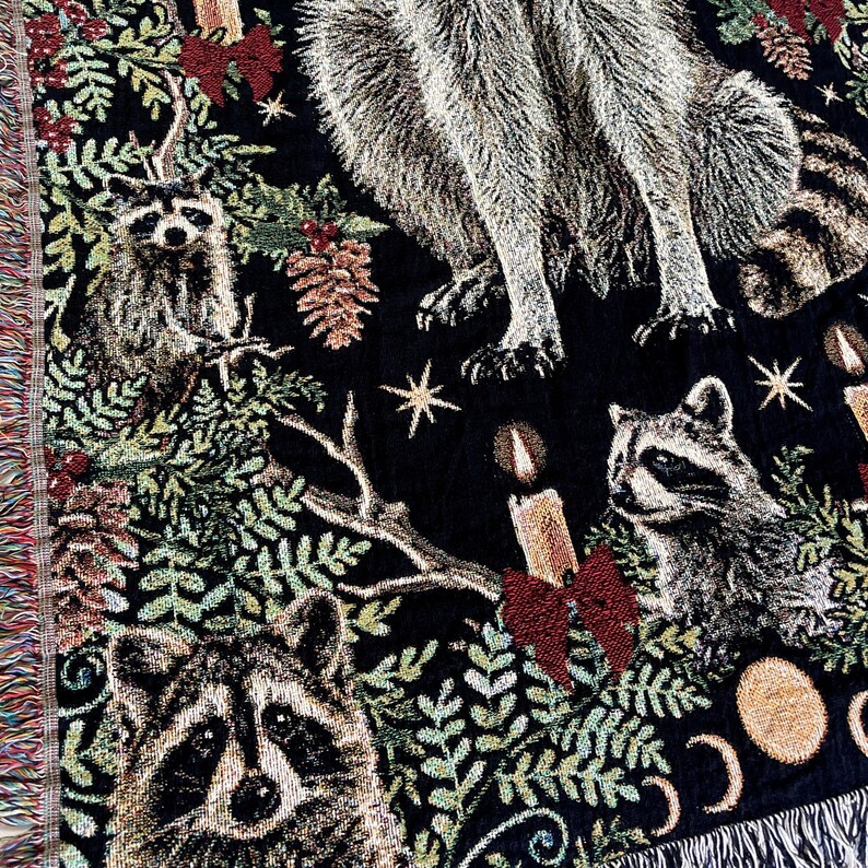 Raccoon gifts for women dont get any better than this raccoon woven blanket with a black background, Christmas candles, stars and moons and botanical leaves