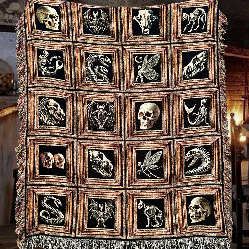 Halloween woven blanket with skeletons, vampires, bats,fairies, snakes, werewolves and black cats.