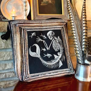 Dark mermaid skeleton tote bag. Mermaidcore tote. Mermaid core tote bag with mermaid skeleton woven into a  black background. The perfect vintage Halloween tote bag.