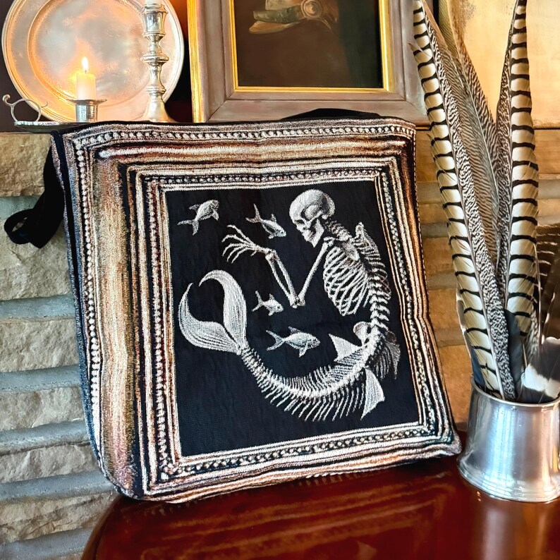 Dark mermaid skeleton tote bag. Mermaidcore tote. Mermaid core tote bag with mermaid skeleton woven into a  black background. The perfect vintage Halloween tote bag.