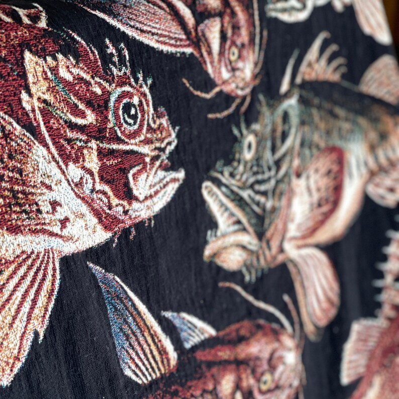 Antique fisherman aesthetic decor. Fishing gift for him. Black woven tapestry blanket with several deep sea fish woven in.