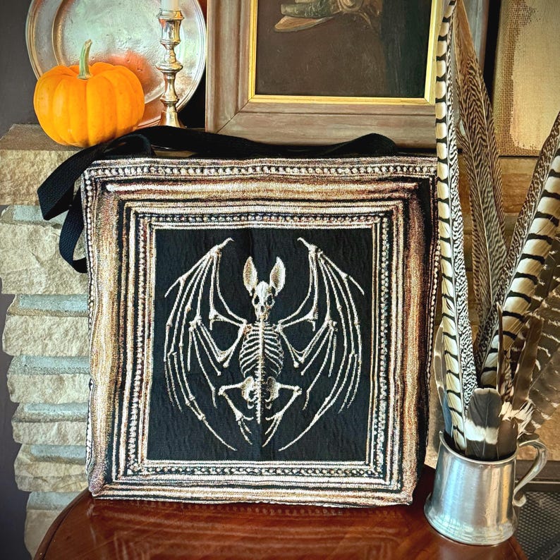 Victorian Gothic vintage bat tote. Halloween tote with bat skeleton woven into a black background.