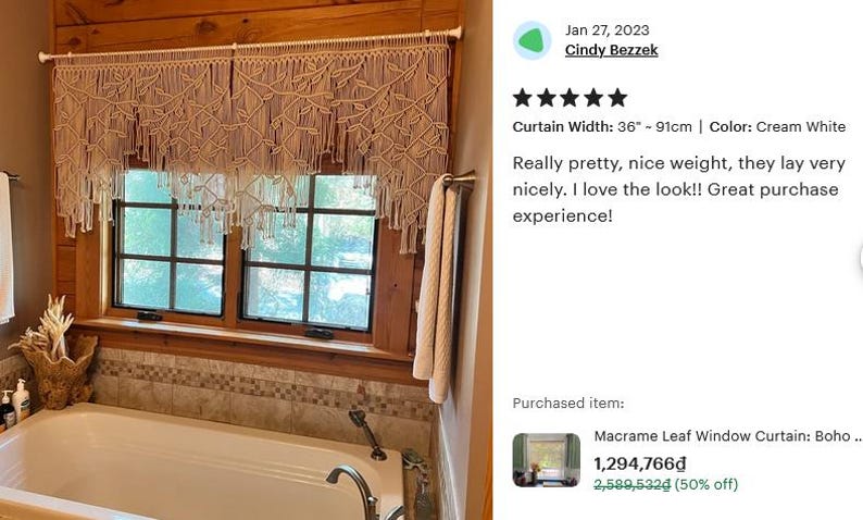 May include: A cream white macrame window curtain featuring a detailed leaf pattern and hanging fringe. The curtain is suspended from a white rod and measures 36 inches in width, providing a decorative covering for a window above a bathtub.