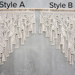 May include: Two off-white macrame wall hangings labeled Style A and Style B, both suspended from a wooden rod. Each piece features a branch design with green leaf accents and a tiered fringe bottom. The text Laha corner is visible in the lower left.