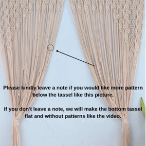 May include: A beige macrame curtain featuring a top wooden rod, intricate knotted leaf-like patterns, and long bottom tassels. Text reads: Beige color. Please kindly leave a note if you would like more pattern below the tassel like this picture.