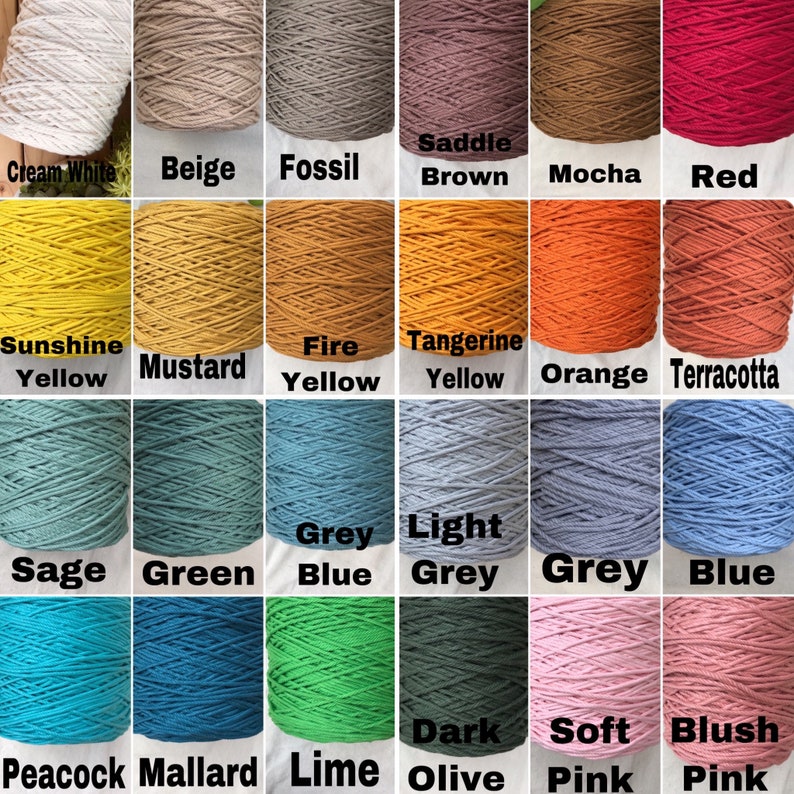 May include: A collection of 20 spools of cotton rope in various colors, including cream, beige, brown, red, yellow, orange, green, blue, grey, and pink. Each spool is labeled with the color name.