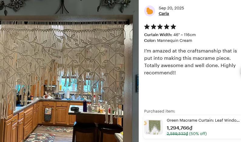 May include: A cream-colored macrame curtain featuring a repeating leaf pattern and a knotted fringe design. The curtain is suspended from a black rod and measures 46 inches in width. The intricate fiber art displays a series of interconnected leaf motifs.