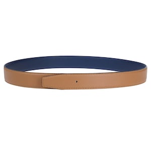 May include: A brown leather belt with a navy blue lining. The belt has a simple buckle and is stitched around the edges.