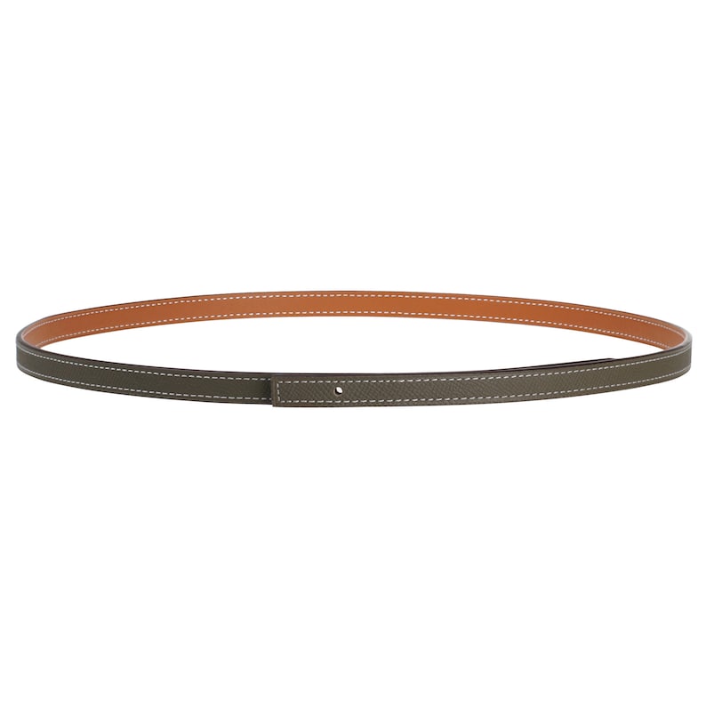 May include: A green leather belt with a brown leather lining and white stitching.